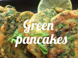Green pancakes with lime butter